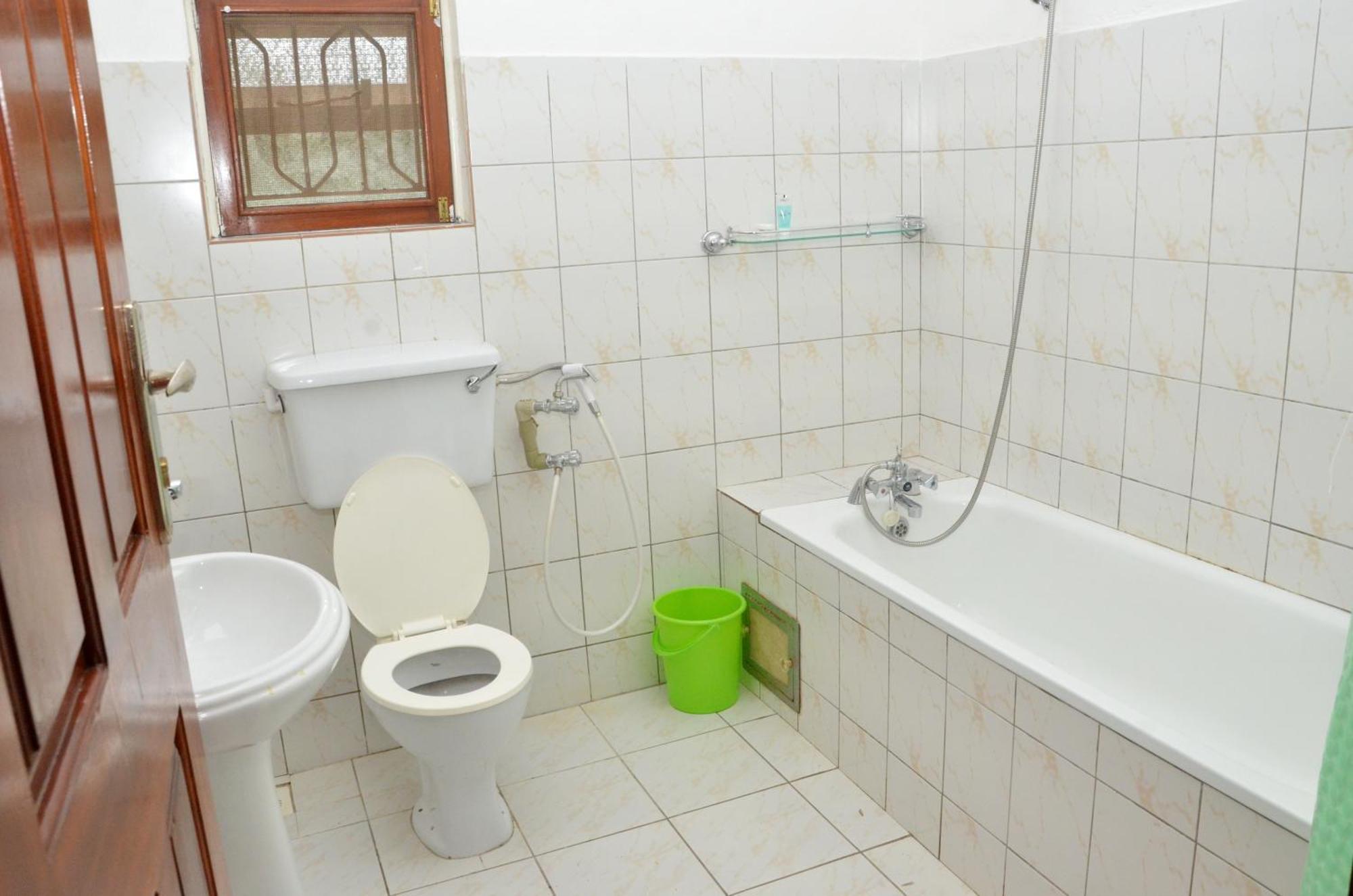 Corinya Serviced Apartments เอนเทบเบ้ ห้อง รูปภาพ