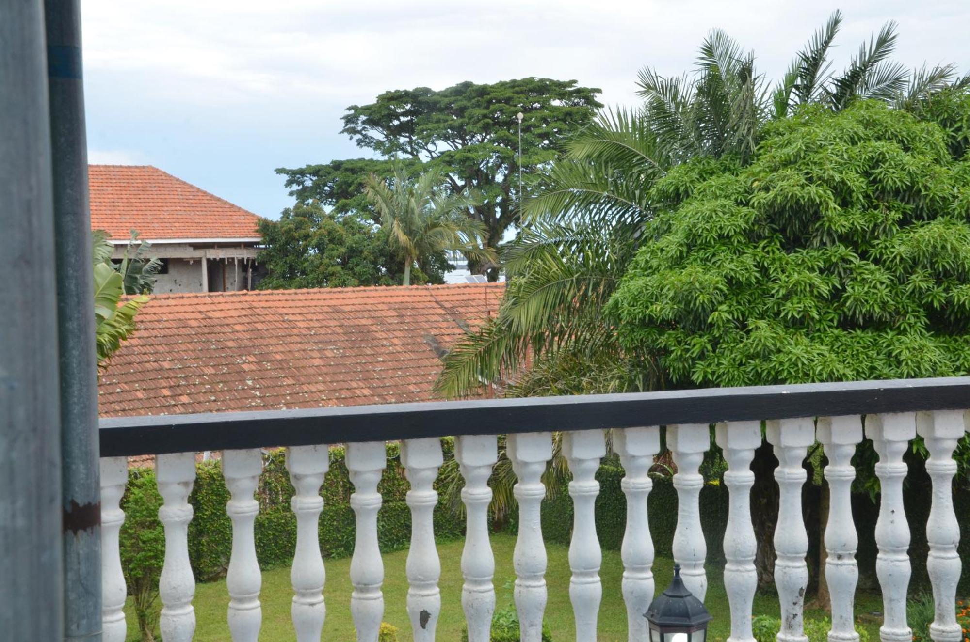 Corinya Serviced Apartments เอนเทบเบ้ ห้อง รูปภาพ
